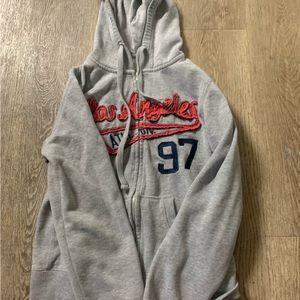 Grey zip up hoodie. Super cute.